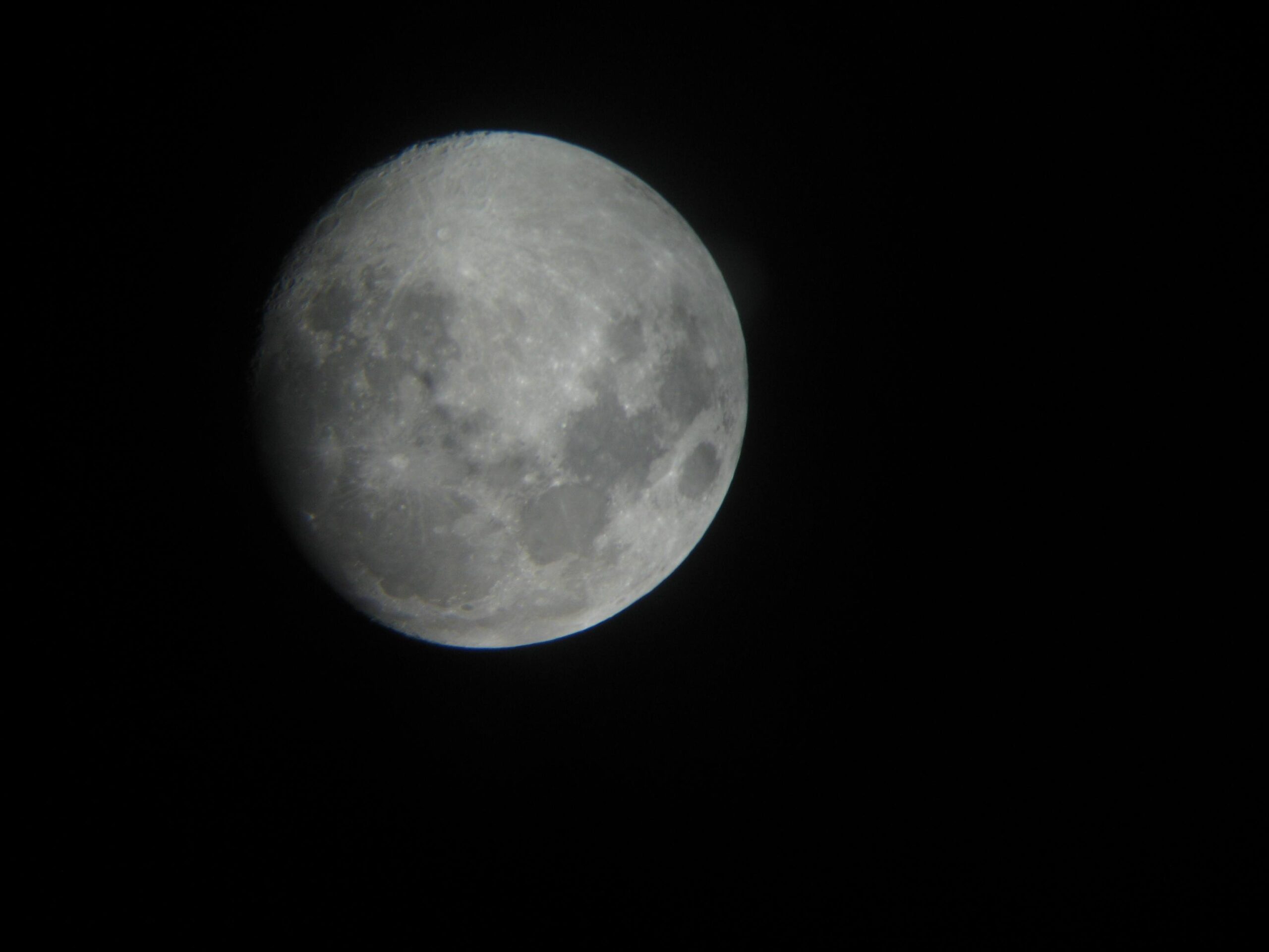 The Moon through a telescope at the observation tour