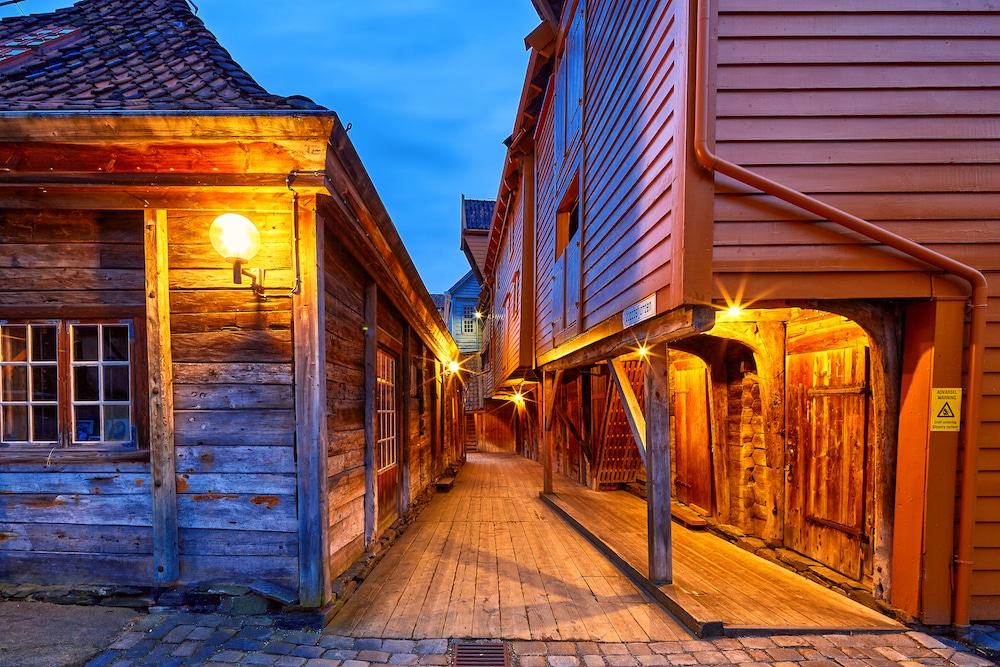Narrow street between wooden houses in old Bryggen area, Bergen, Norway